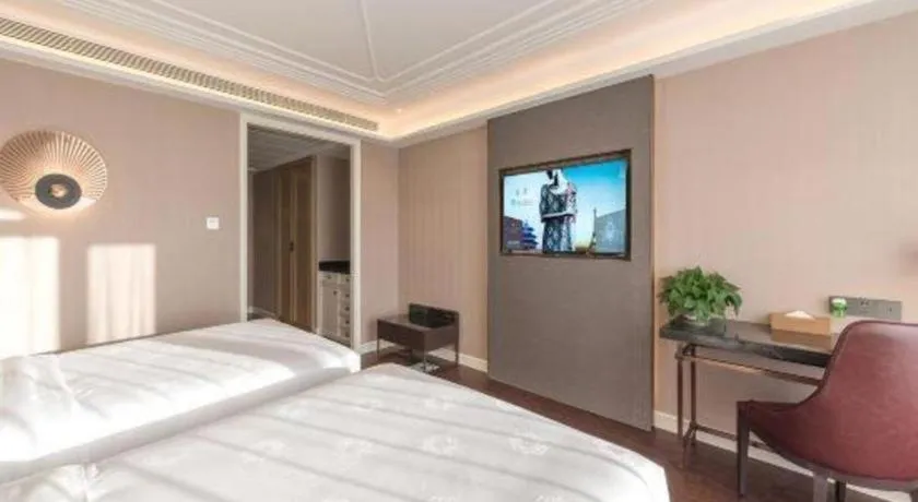 Bed in James Joyce Coffetel Harbin West High-speed Railway Station Wanda Plaza