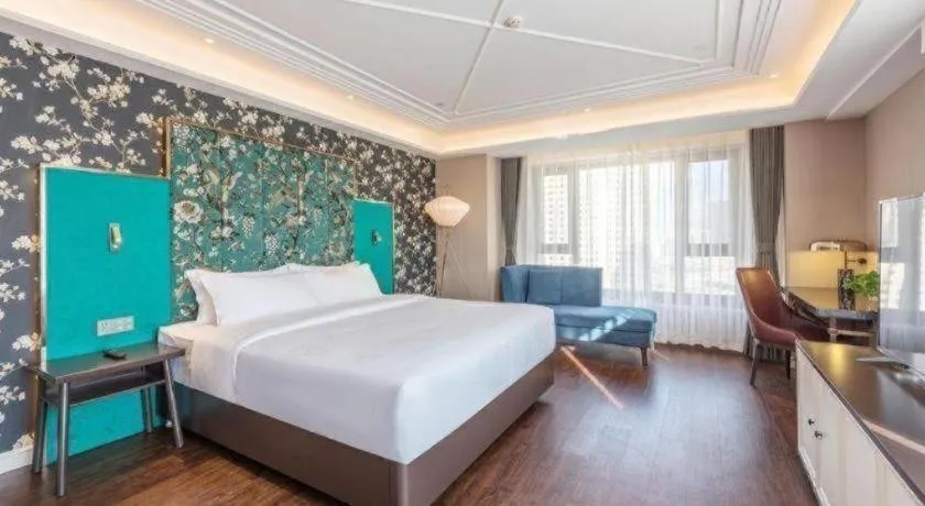 Bed in James Joyce Coffetel Harbin West High-speed Railway Station Wanda Plaza