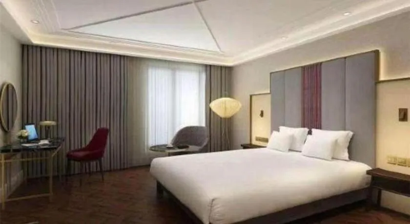 Bed in James Joyce Coffetel Harbin West High-speed Railway Station Wanda Plaza