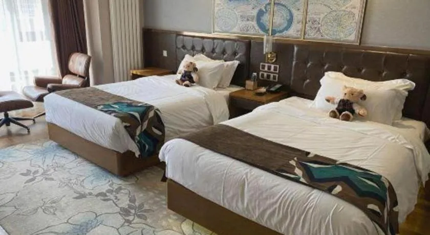 Bed in James Joyce Coffetel Harbin West High-speed Railway Station Wanda Plaza