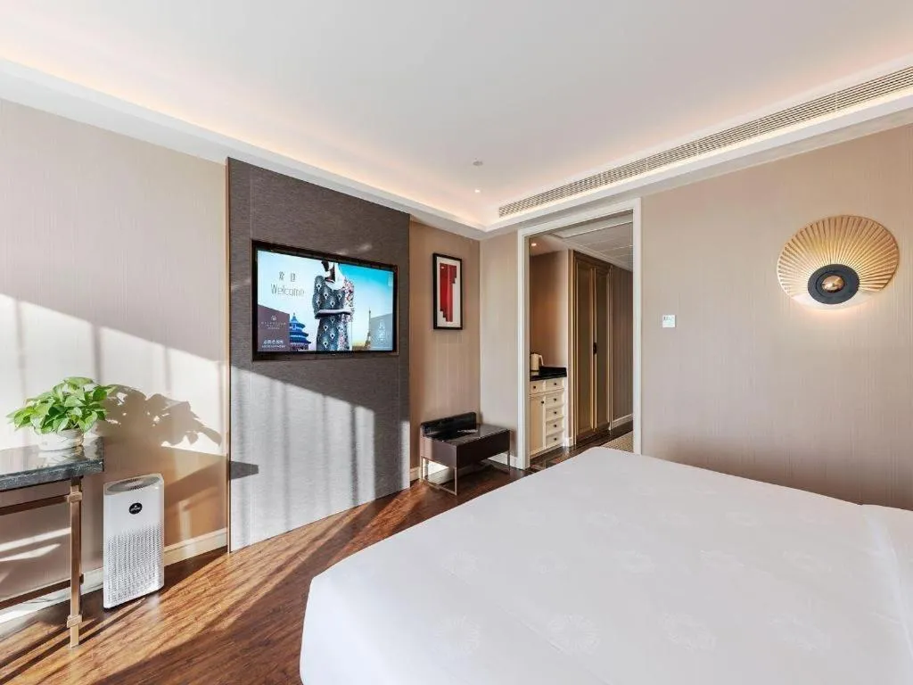 Bed in James Joyce Coffetel Harbin West High-speed Railway Station Wanda Plaza