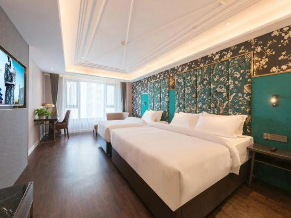 Bed in James Joyce Coffetel Harbin West High-speed Railway Station Wanda Plaza