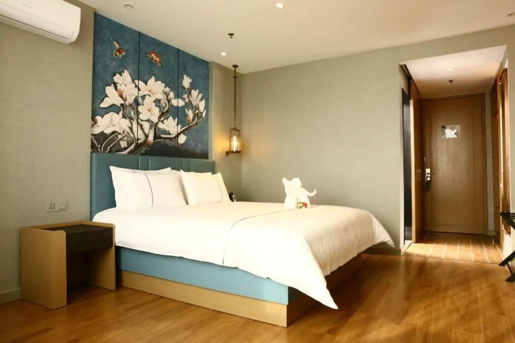 Bed in Magnotel Hengshui Lake Jizhou Middle School