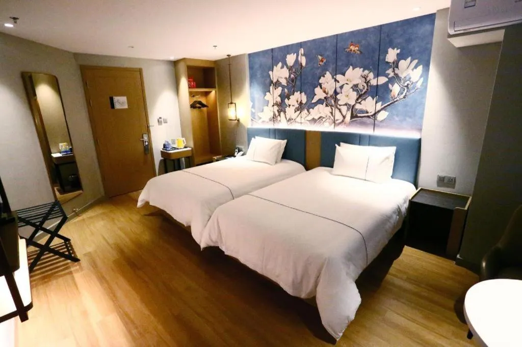 Bed in Magnotel Hengshui Lake Jizhou Middle School