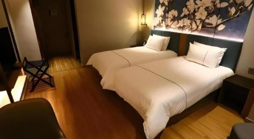 Bed in Magnotel Hengshui Lake Jizhou Middle School