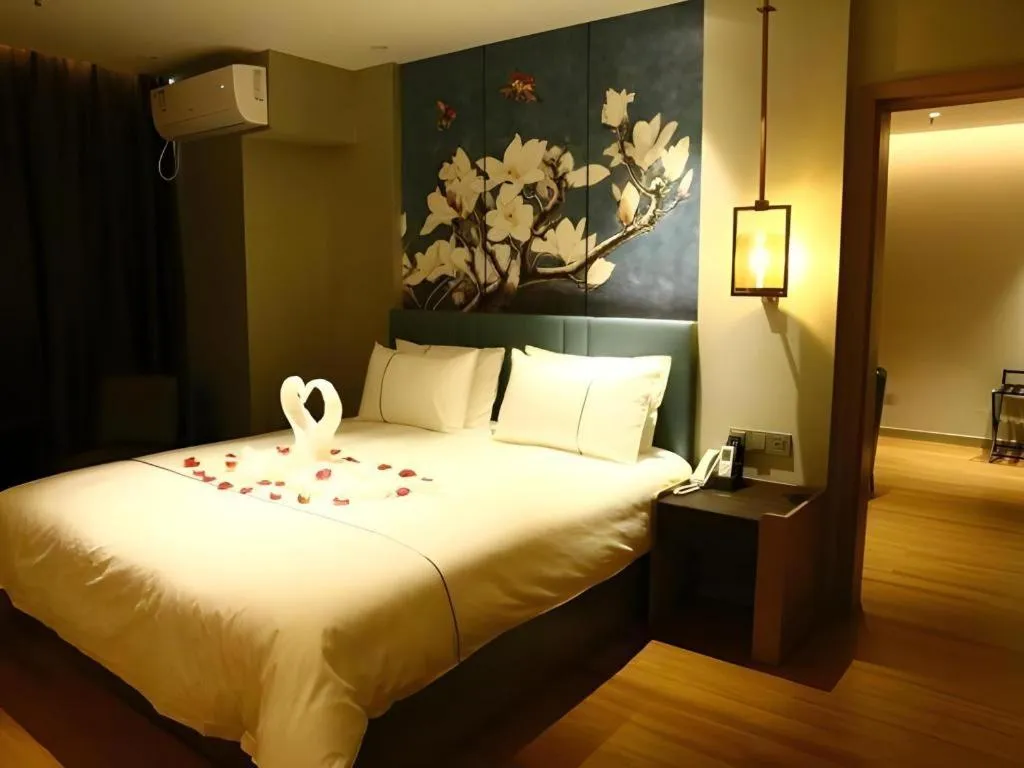 Bed in Magnotel Hengshui Lake Jizhou Middle School