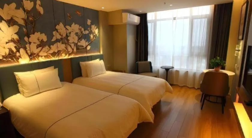 Bed in Magnotel Hengshui Lake Jizhou Middle School