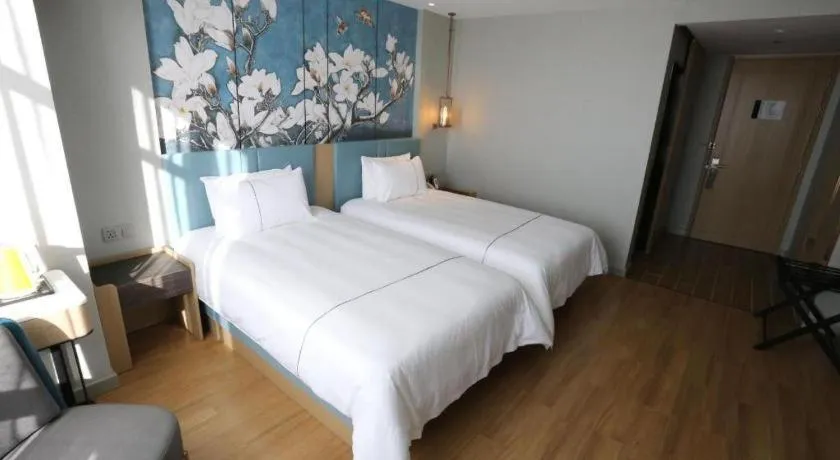 Bed in Magnotel Hengshui Lake Jizhou Middle School