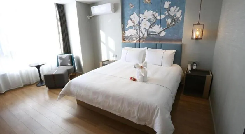 Bed in Magnotel Hengshui Lake Jizhou Middle School