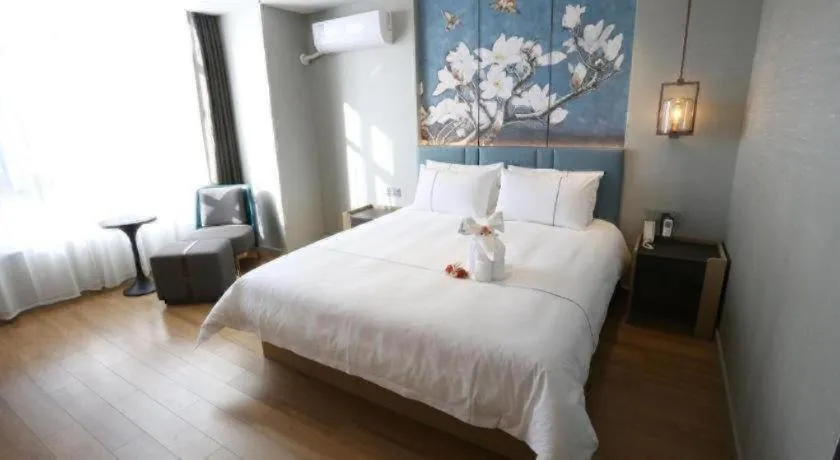 Bed in Magnotel Hengshui Lake Jizhou Middle School