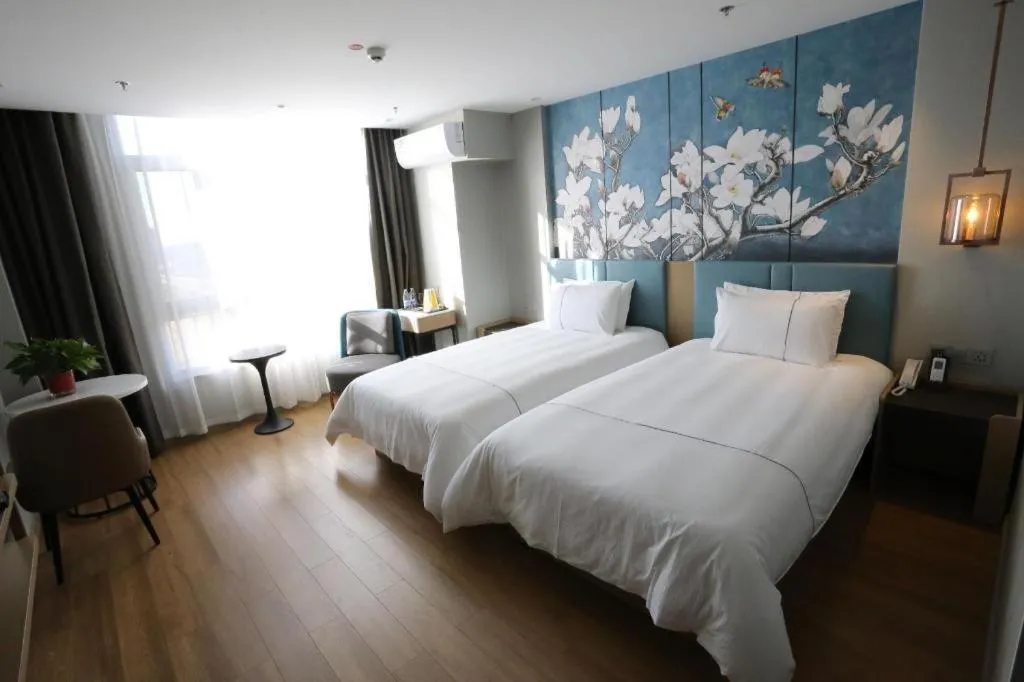 Bed in Magnotel Hengshui Lake Jizhou Middle School