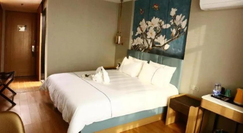 Bed in Magnotel Hengshui Lake Jizhou Middle School