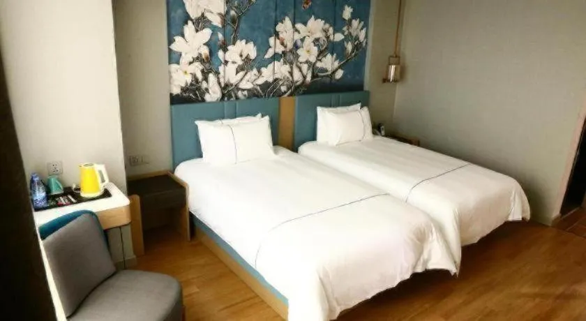 Bed in Magnotel Hengshui Lake Jizhou Middle School