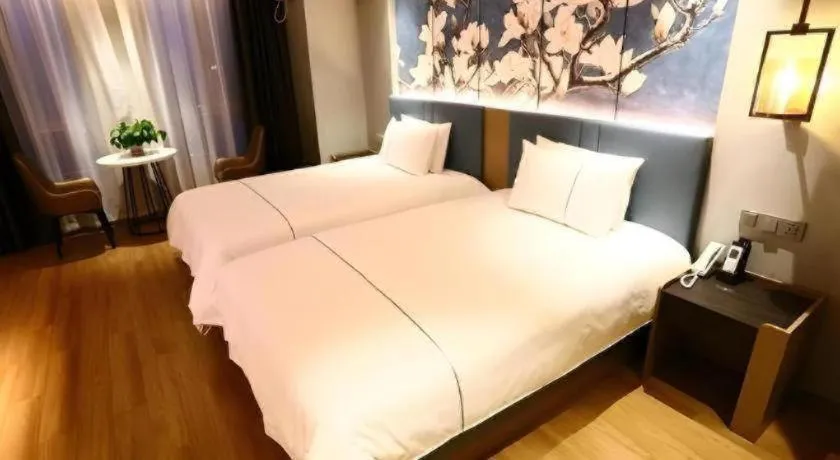 Bed in Magnotel Hengshui Lake Jizhou Middle School