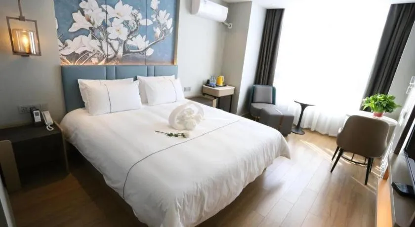 Bed in Magnotel Hengshui Lake Jizhou Middle School