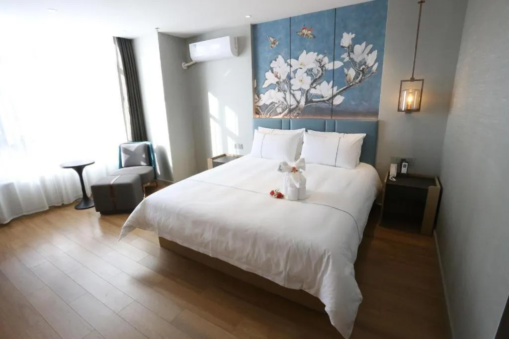 Bed in Magnotel Hengshui Lake Jizhou Middle School