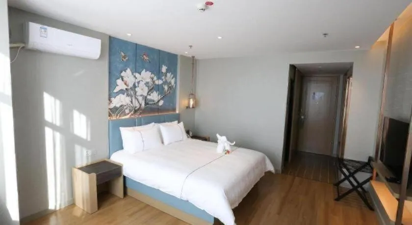 Bed in Magnotel Hengshui Lake Jizhou Middle School