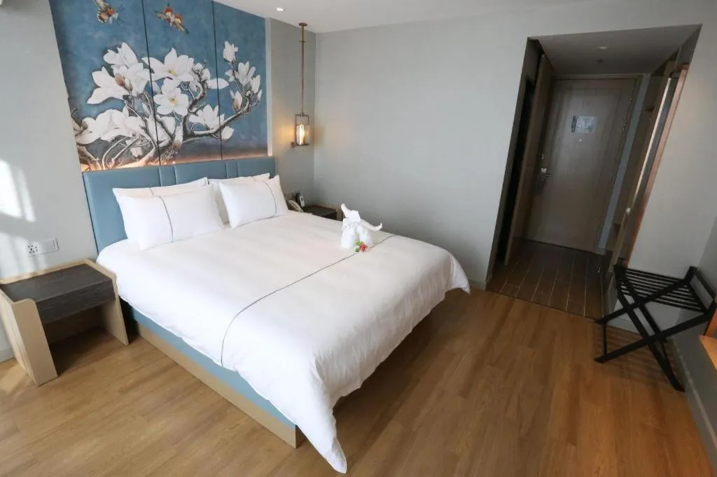 Bed in Magnotel Hengshui Lake Jizhou Middle School