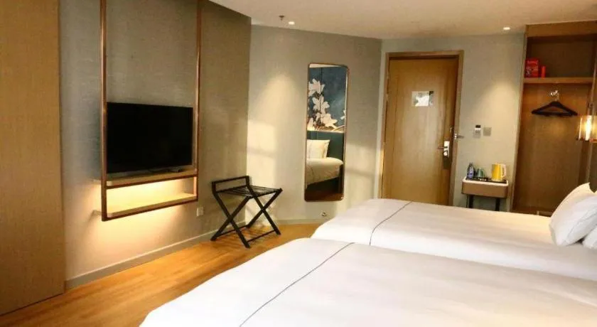 Bed in Magnotel Hengshui Lake Jizhou Middle School