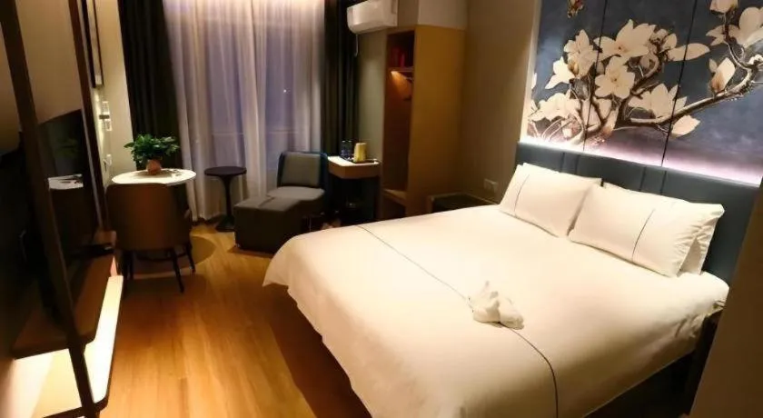 Bed in Magnotel Hengshui Lake Jizhou Middle School