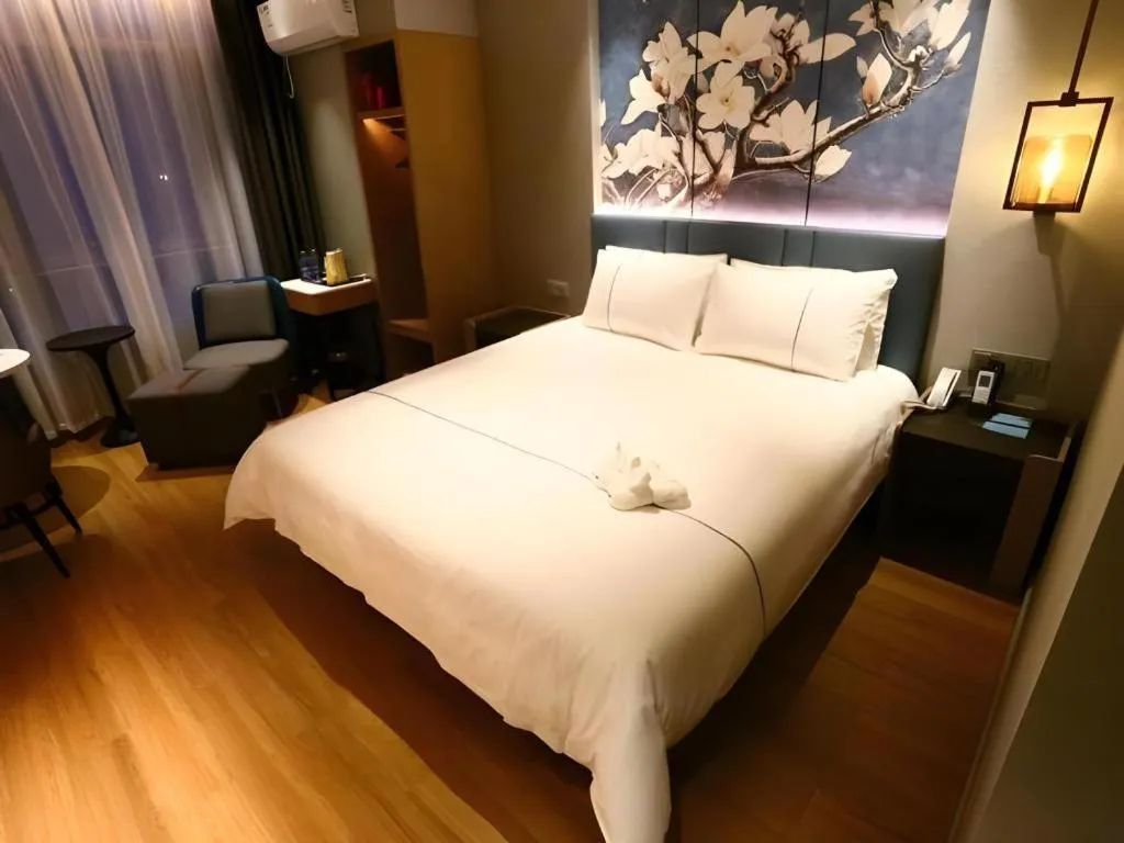 Bed in Magnotel Hengshui Lake Jizhou Middle School