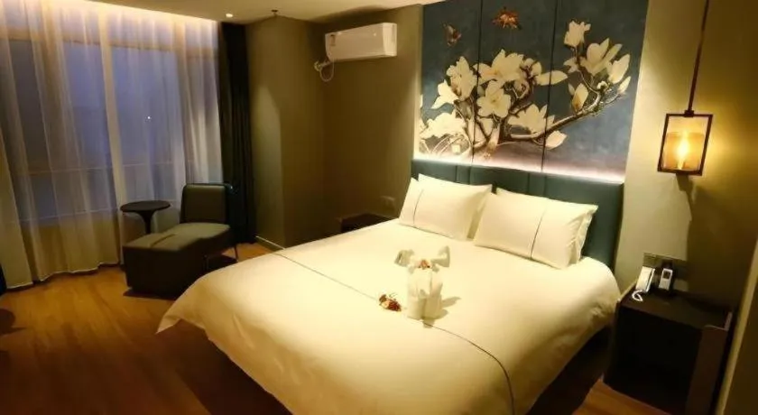 Bed in Magnotel Hengshui Lake Jizhou Middle School