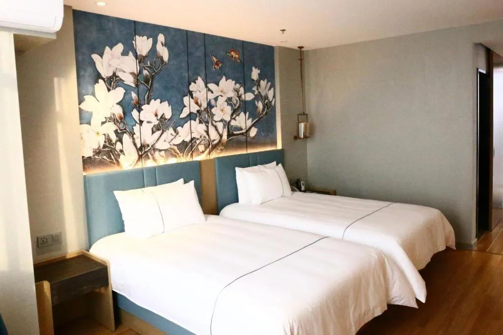 Bed in Magnotel Hengshui Lake Jizhou Middle School