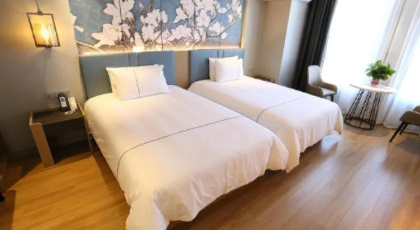 Bed in Magnotel Hengshui Lake Jizhou Middle School