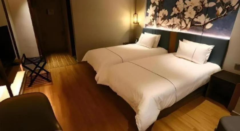 Bed in Magnotel Hengshui Lake Jizhou Middle School