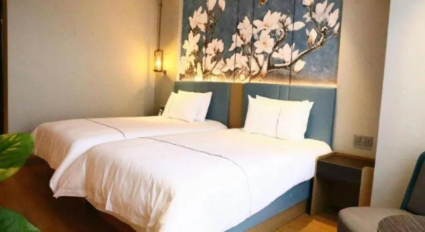 Bed in Magnotel Hengshui Lake Jizhou Middle School