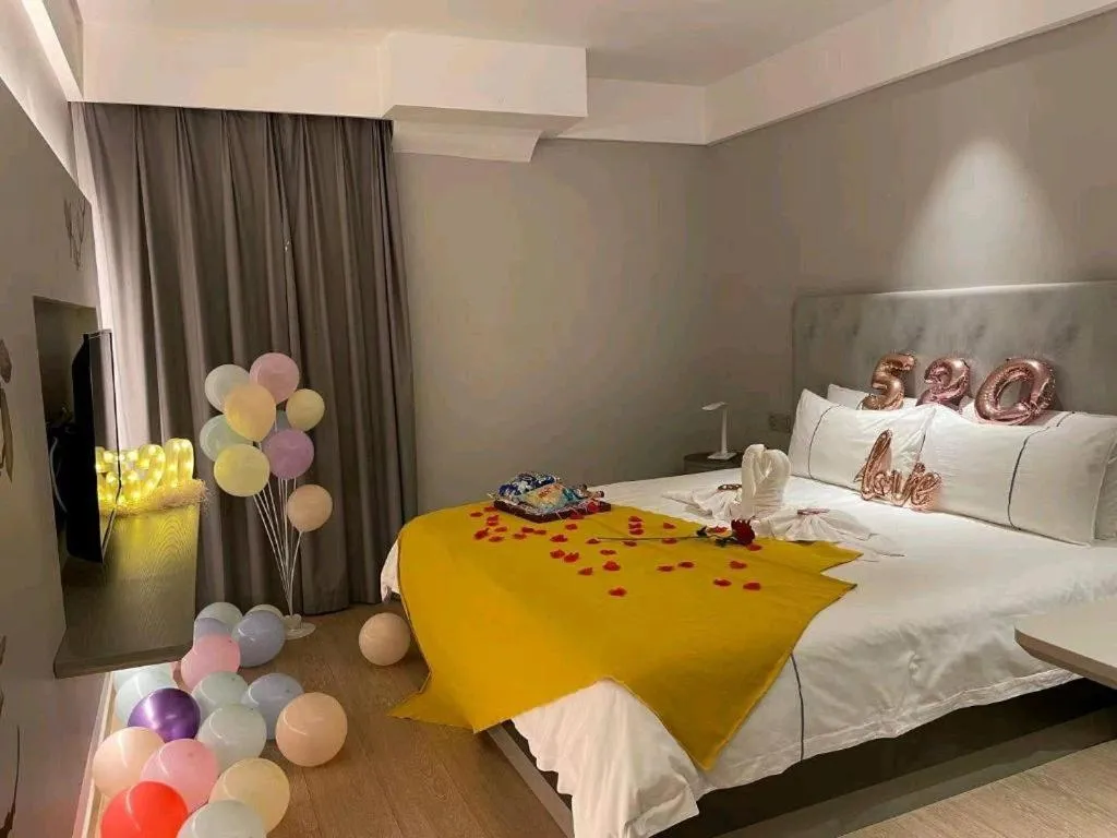 Bed in Magnotel Hotel Wuhan Jiangtan Lihuangpo Road Pedestrian Street