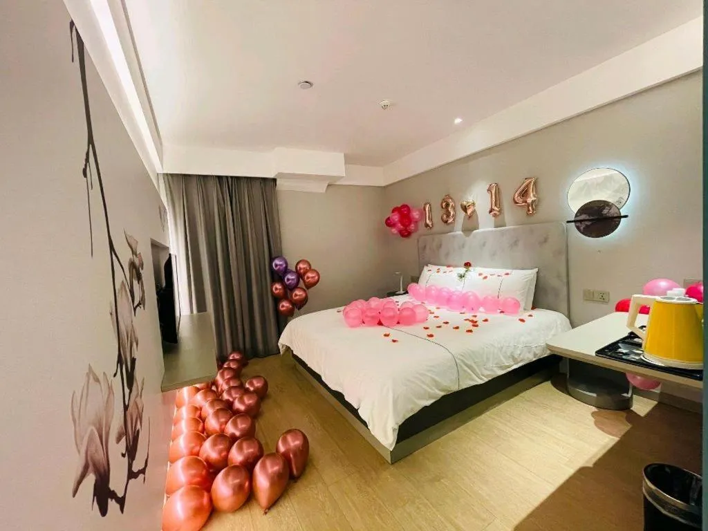 Bed in Magnotel Hotel Wuhan Jiangtan Lihuangpo Road Pedestrian Street