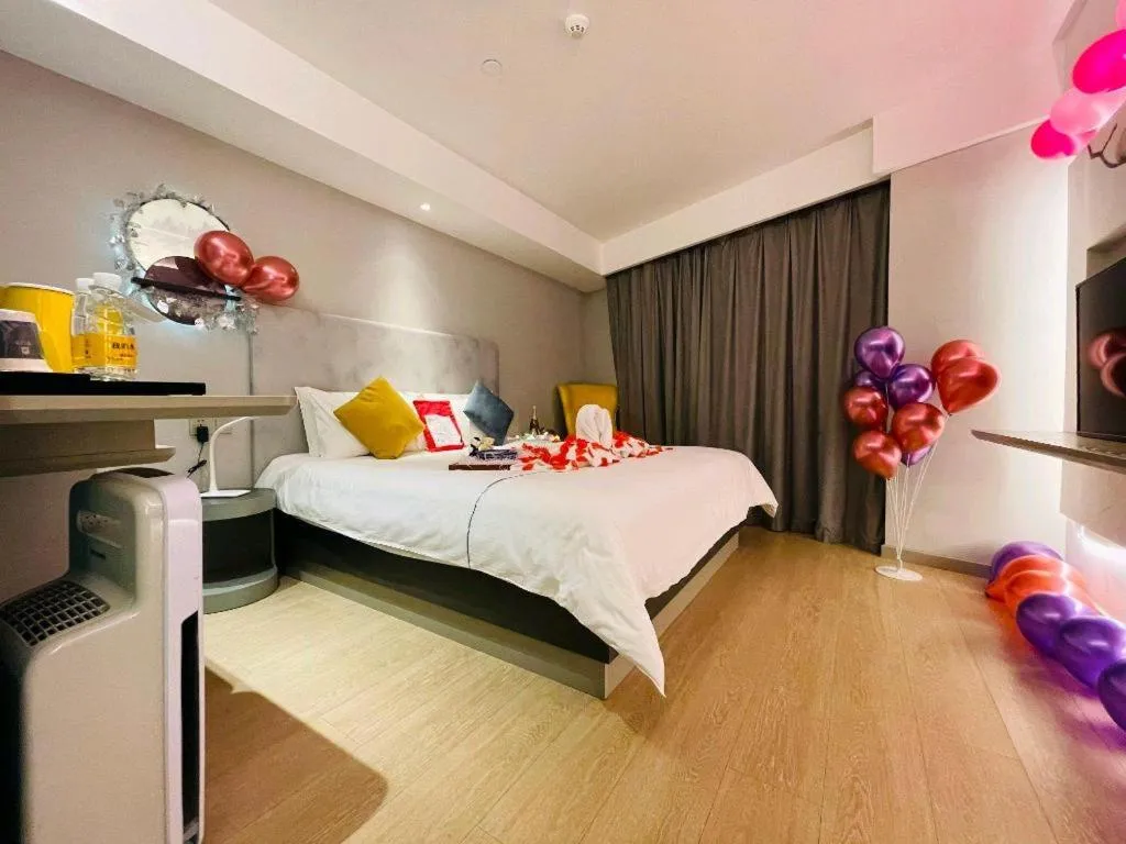 Bed in Magnotel Hotel Wuhan Jiangtan Lihuangpo Road Pedestrian Street