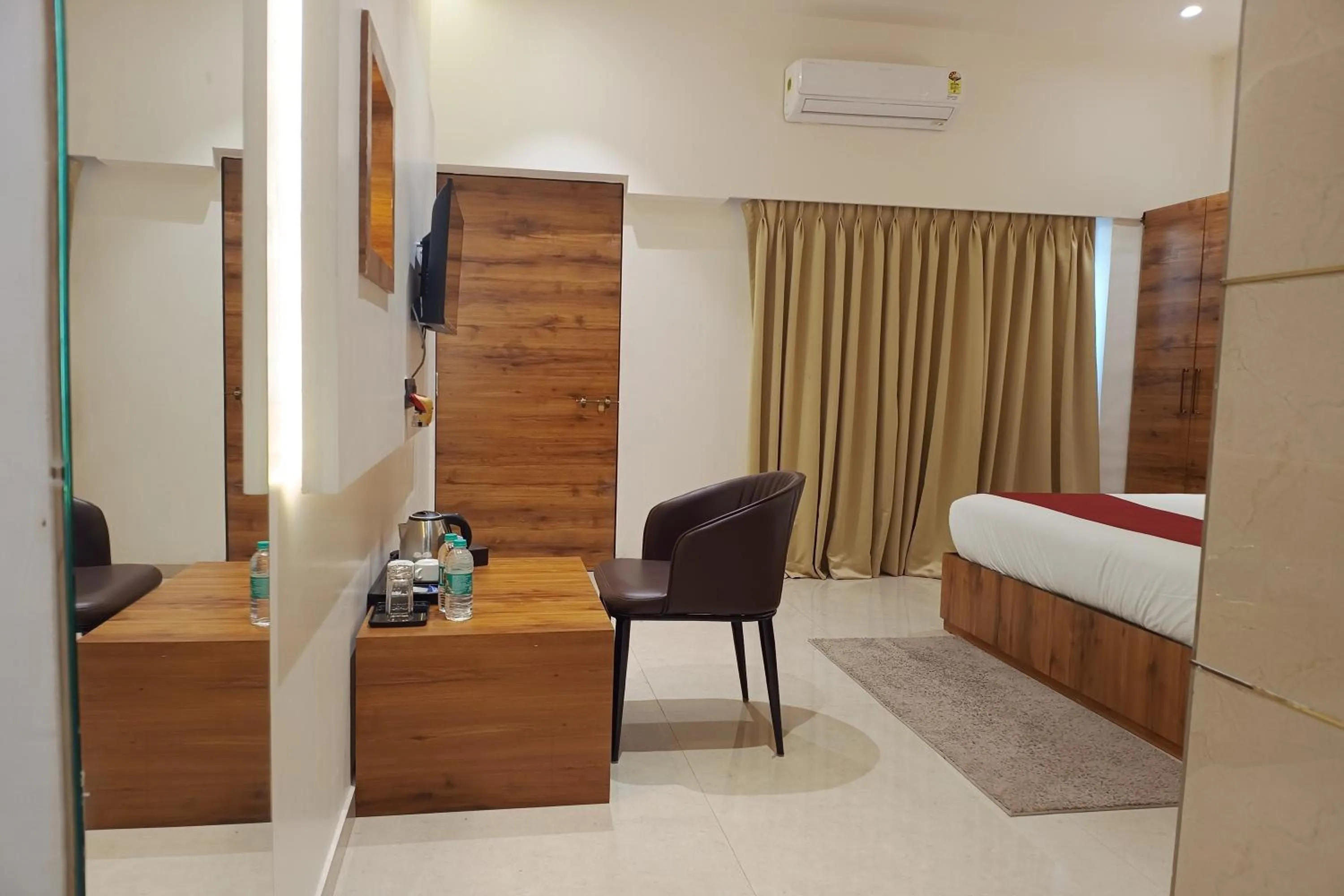 Bedroom, Bed in Madhav Residency Hotel & Banquet, Kalyan, Mumbai