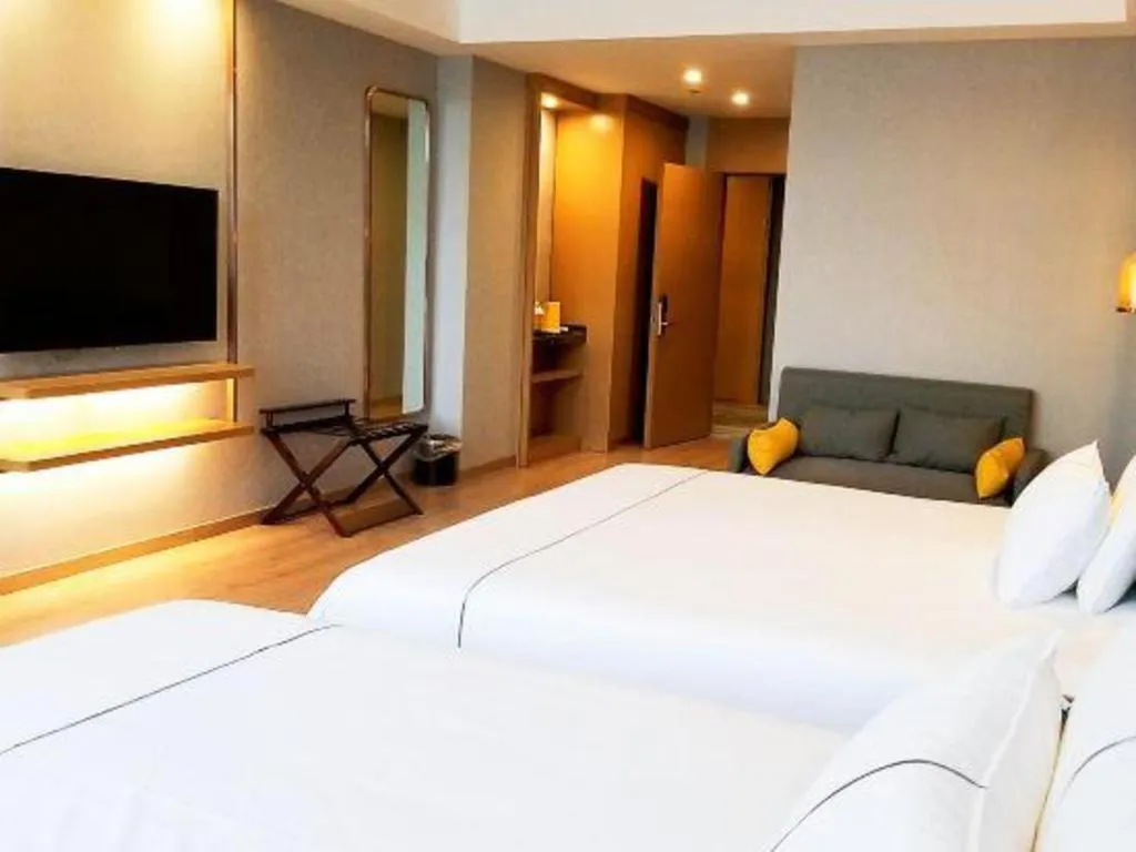 Bed in Magnotel Nanjing Lishui Baota Bei Road