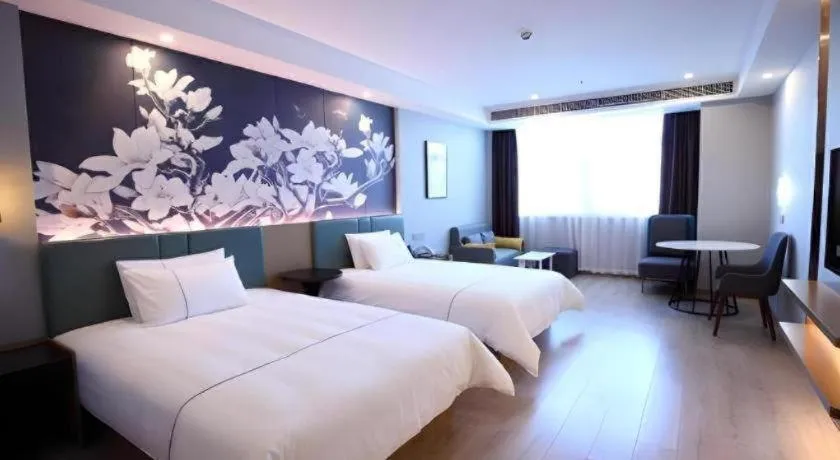 Bed in Magnotel Nanjing Lishui Baota Bei Road