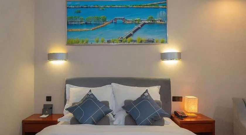 Bed in Chonpines Hotel Jining Quanmin Fitness Plaza