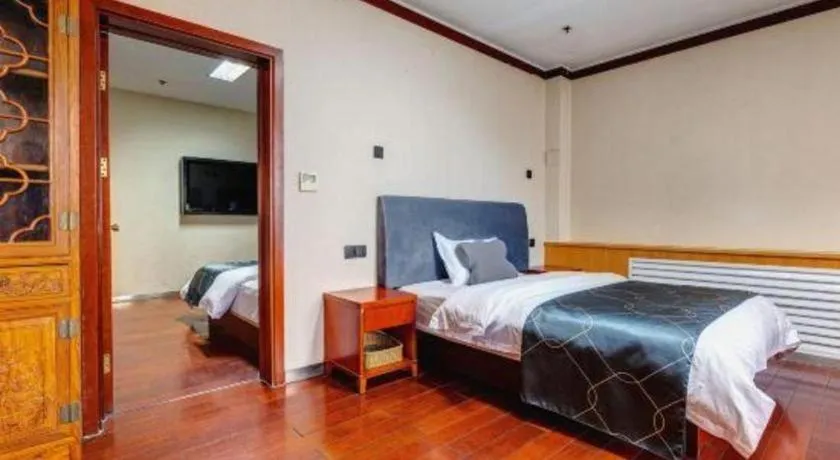 Bed in Chonpines Hotel Jining Quanmin Fitness Plaza