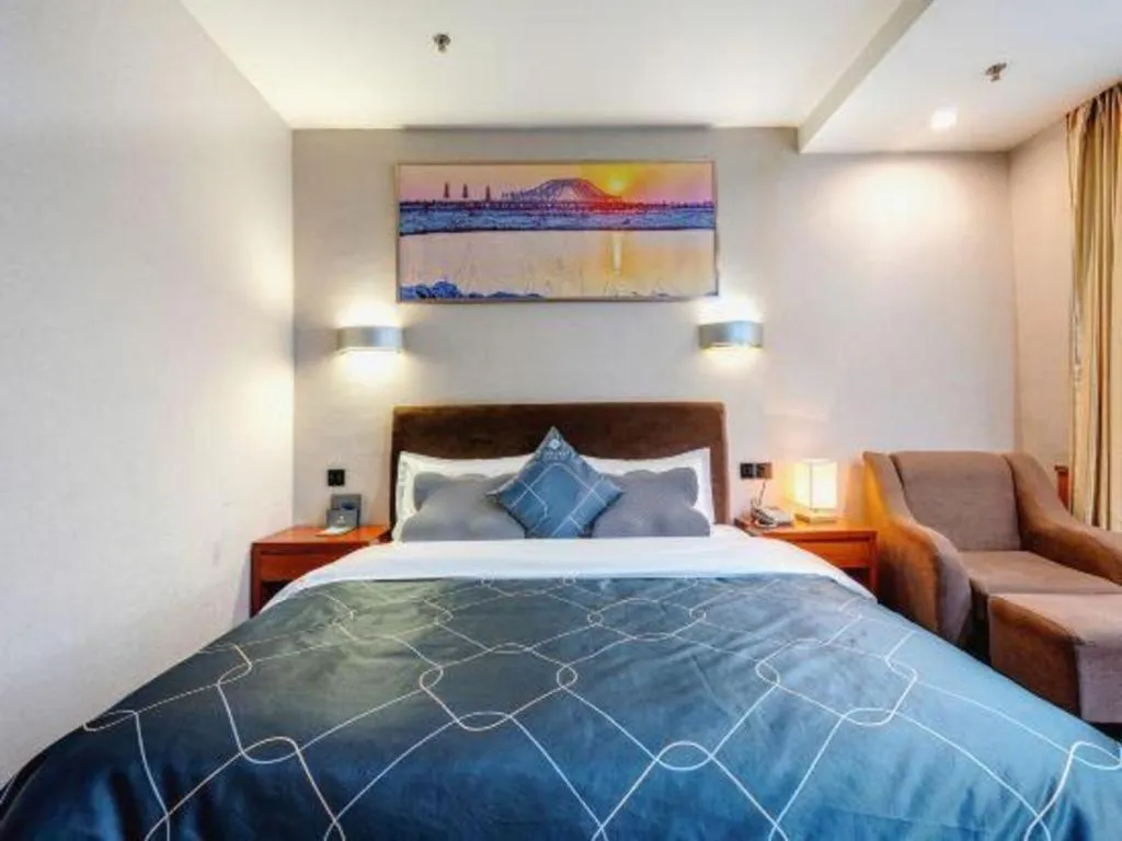 Bed in Chonpines Hotel Jining Quanmin Fitness Plaza