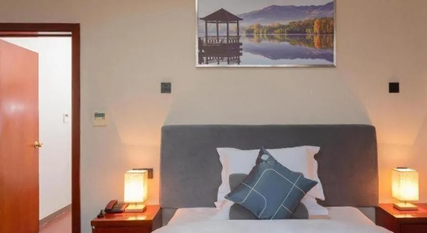 Bed in Chonpines Hotel Jining Quanmin Fitness Plaza