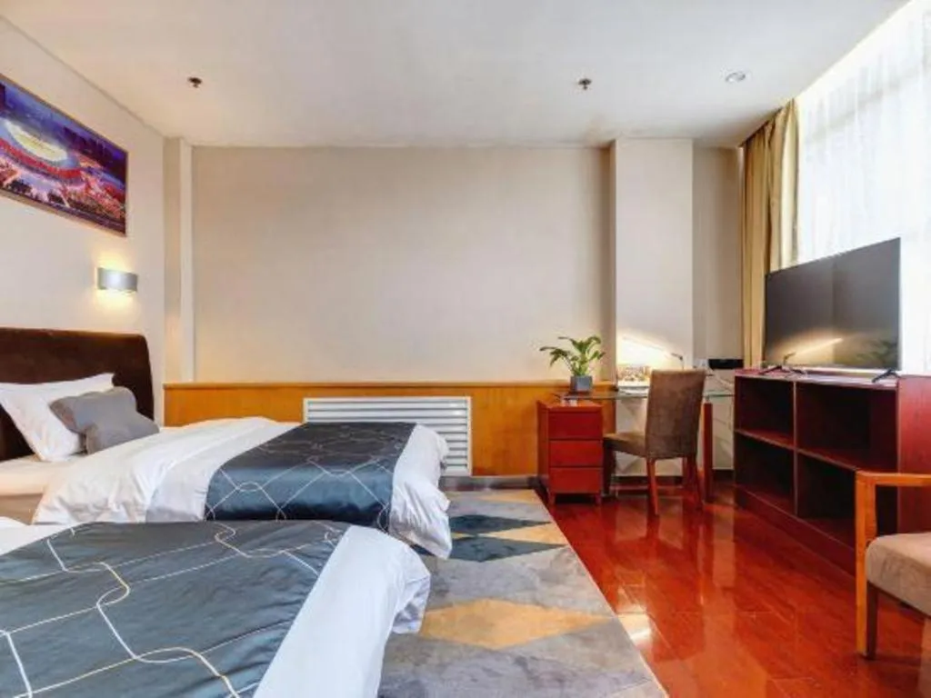 Bed in Chonpines Hotel Jining Quanmin Fitness Plaza