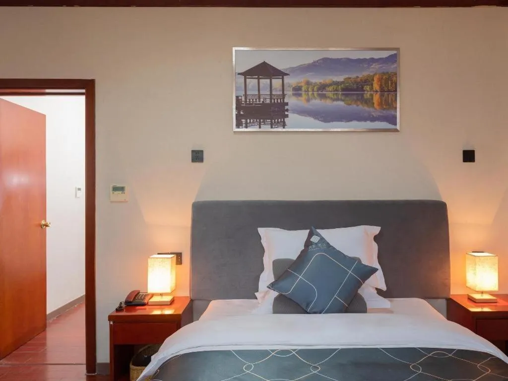 Bed in Chonpines Hotel Jining Quanmin Fitness Plaza