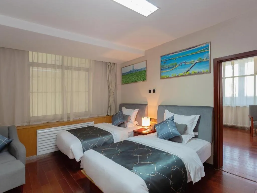 Bed in Chonpines Hotel Jining Quanmin Fitness Plaza