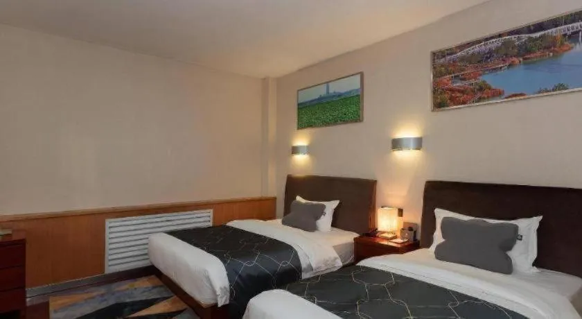 Bed in Chonpines Hotel Jining Quanmin Fitness Plaza