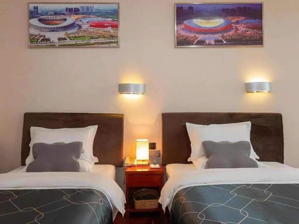 Bed in Chonpines Hotel Jining Quanmin Fitness Plaza