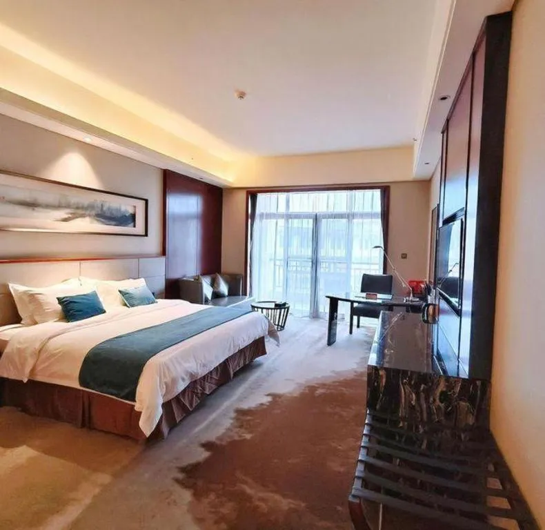 Bed in Country Garden Phoenix Hotel Yiyang