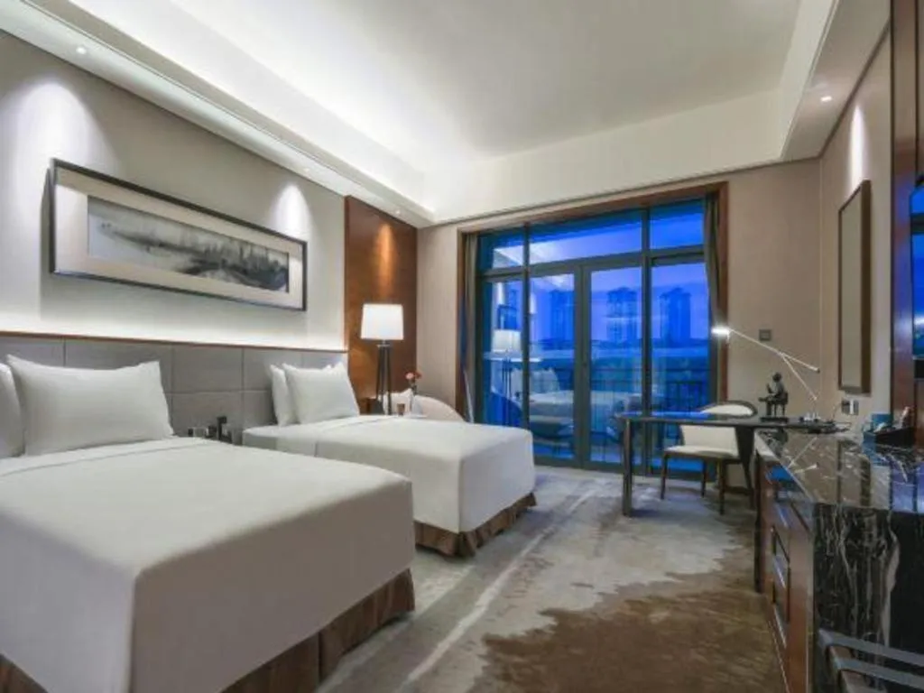 Bed in Country Garden Phoenix Hotel Yiyang