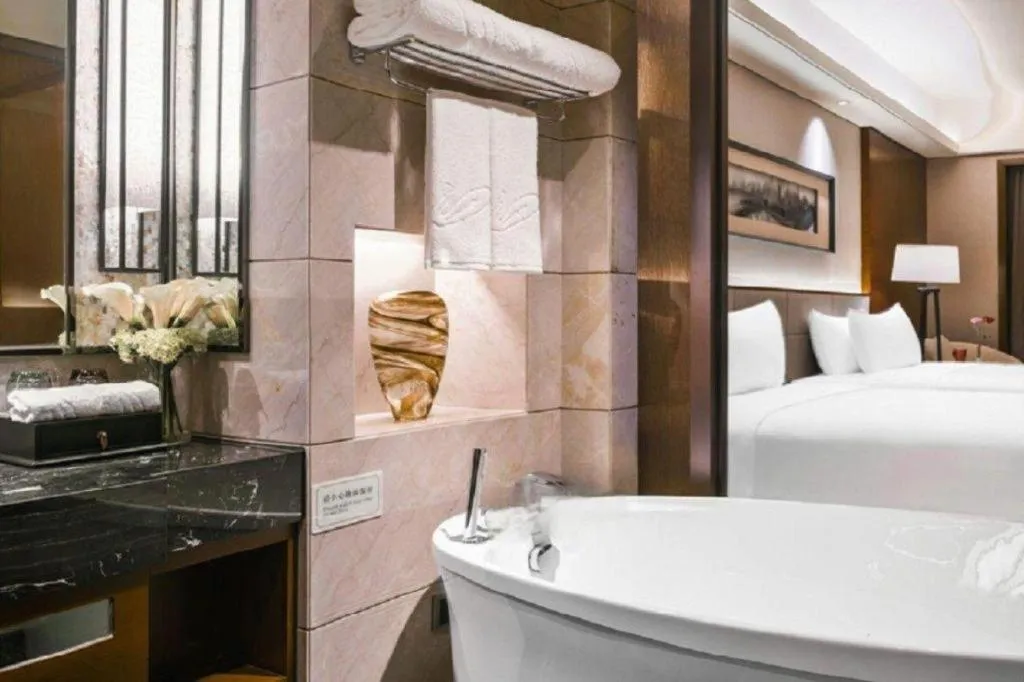 Bed in Country Garden Phoenix Hotel Yiyang