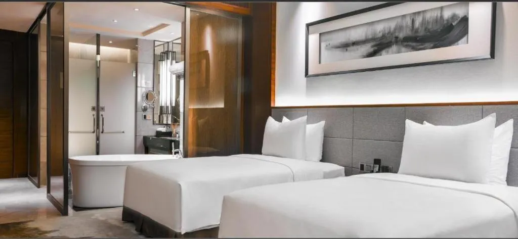 Bed in Country Garden Phoenix Hotel Yiyang