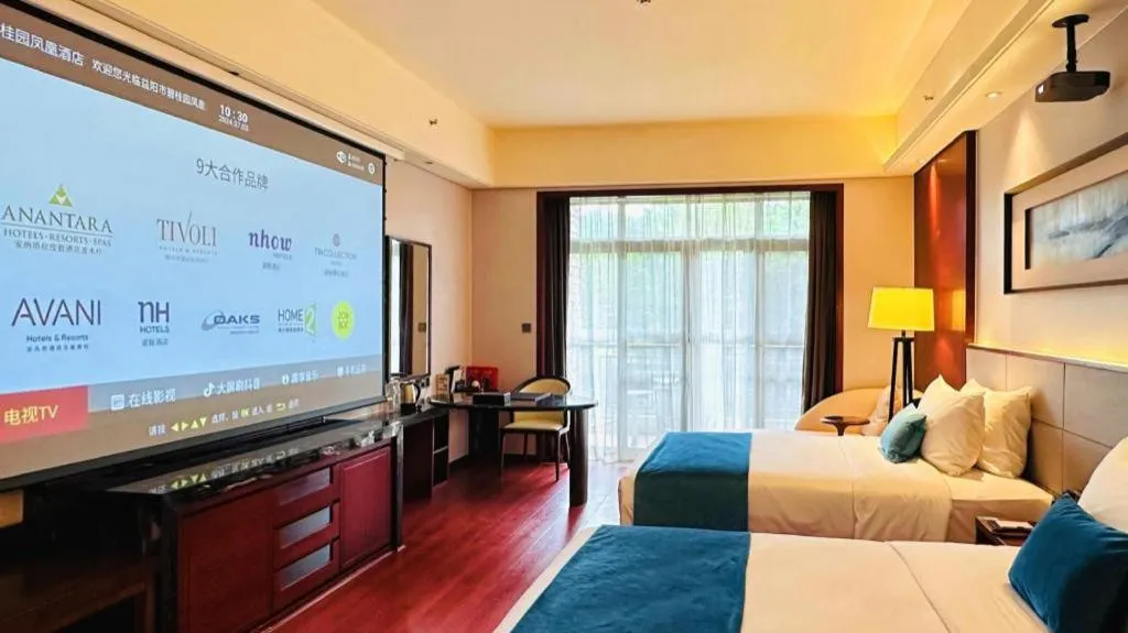 Bed in Country Garden Phoenix Hotel Yiyang